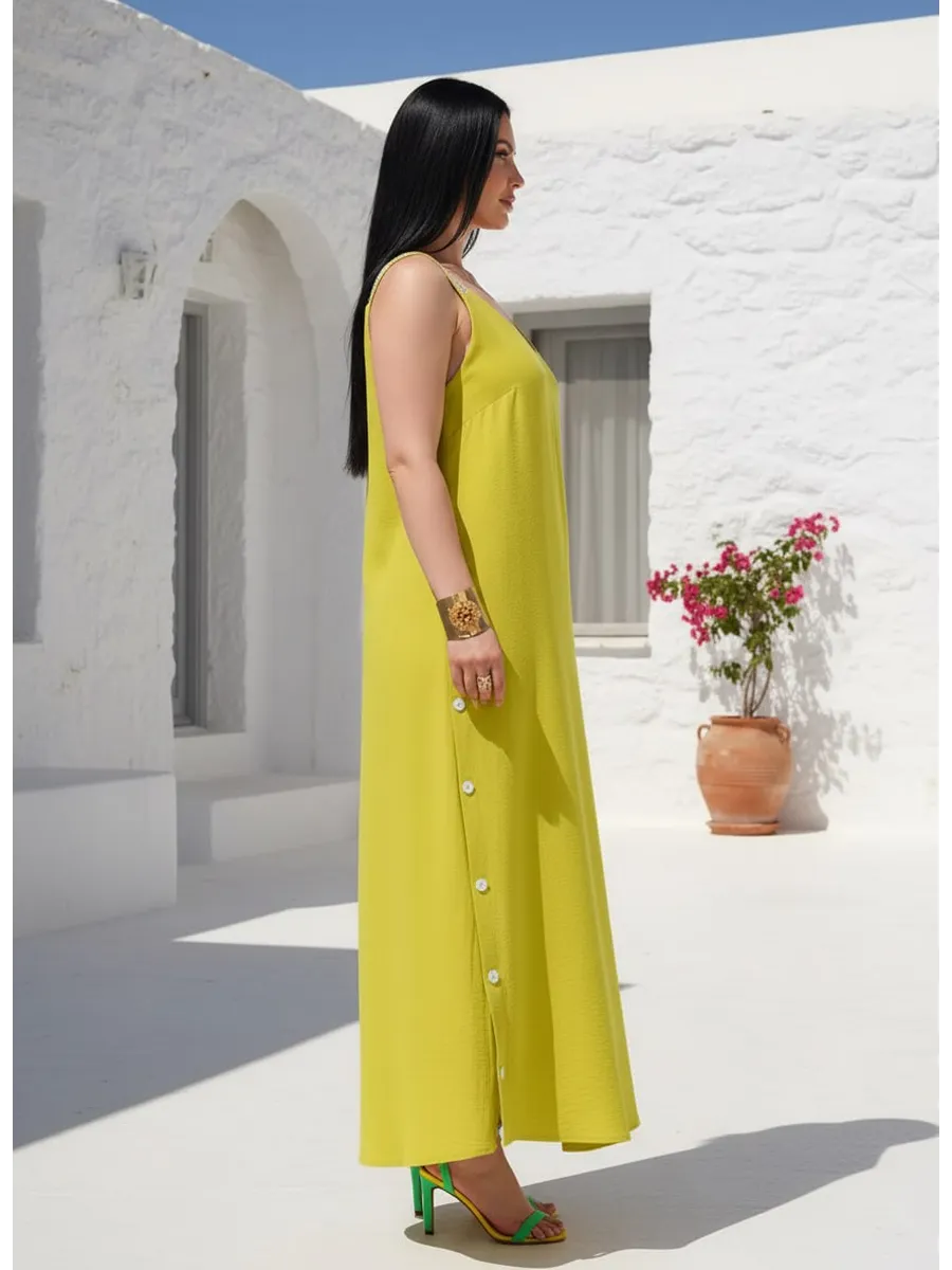 فستان "نسيم الصيف" المنسدل بالأزرار الجانبية والظهر الماسي البراق ✨👗